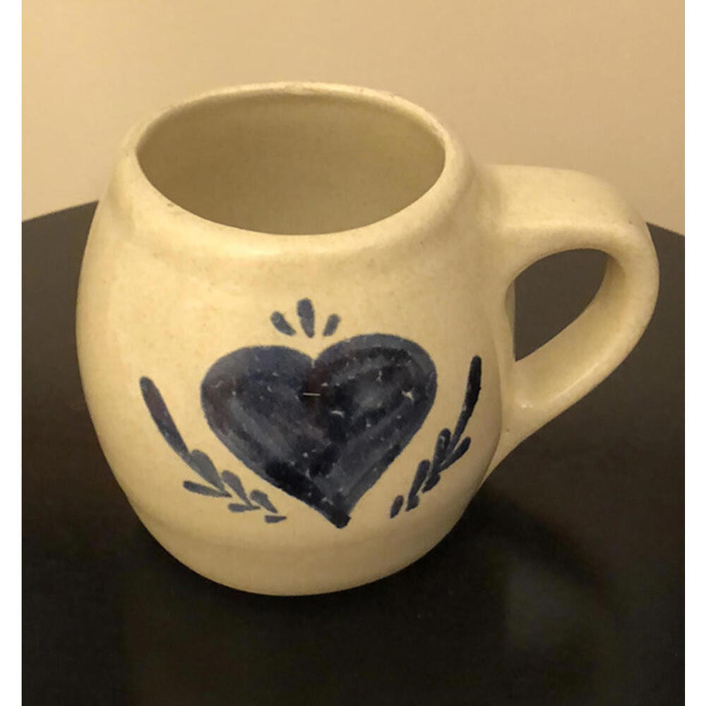 Mug pottery signed.